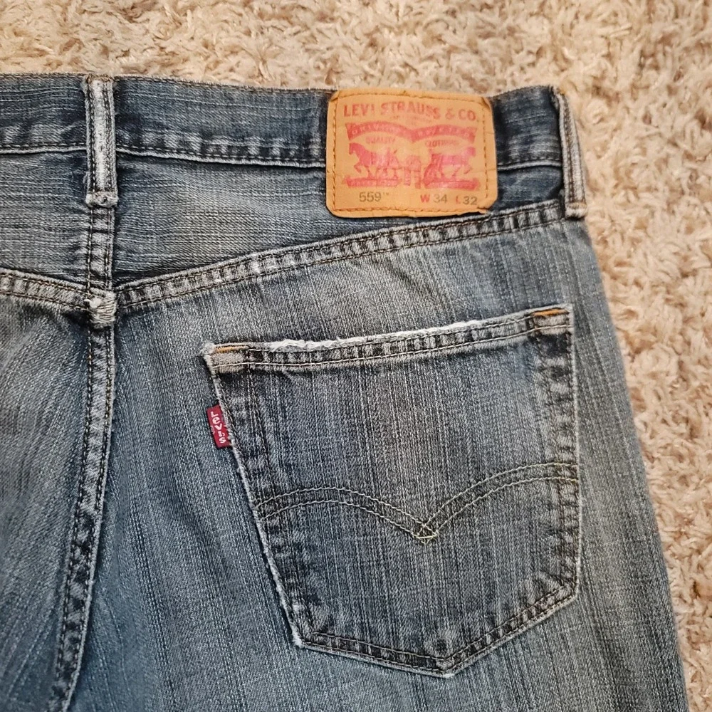 Levi's 559 Relaxed Straight Jeans Mens 34x32 Blue Medium Wash Distressed Cotton‎